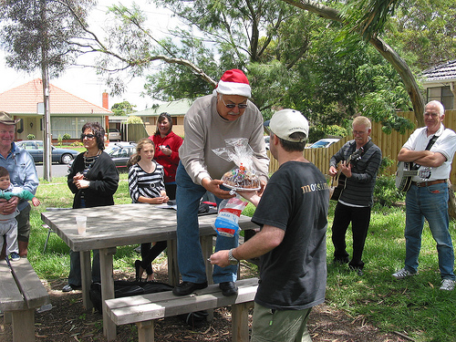 George giving out Lucky Draw Present