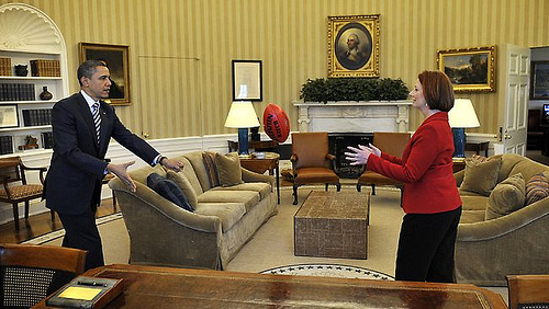 Julia Gillard and Barrack Obama trying Aussie Rules Game